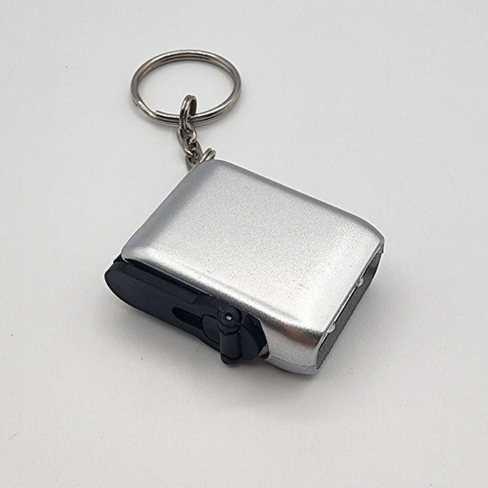 Avon Key Chain with Hand Crank Flashlight Silver OS